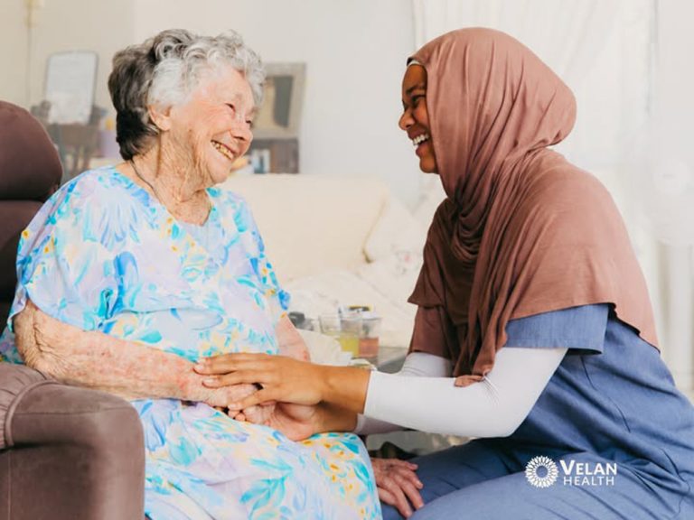 Home Care Provider Assisting an Elderly Woman